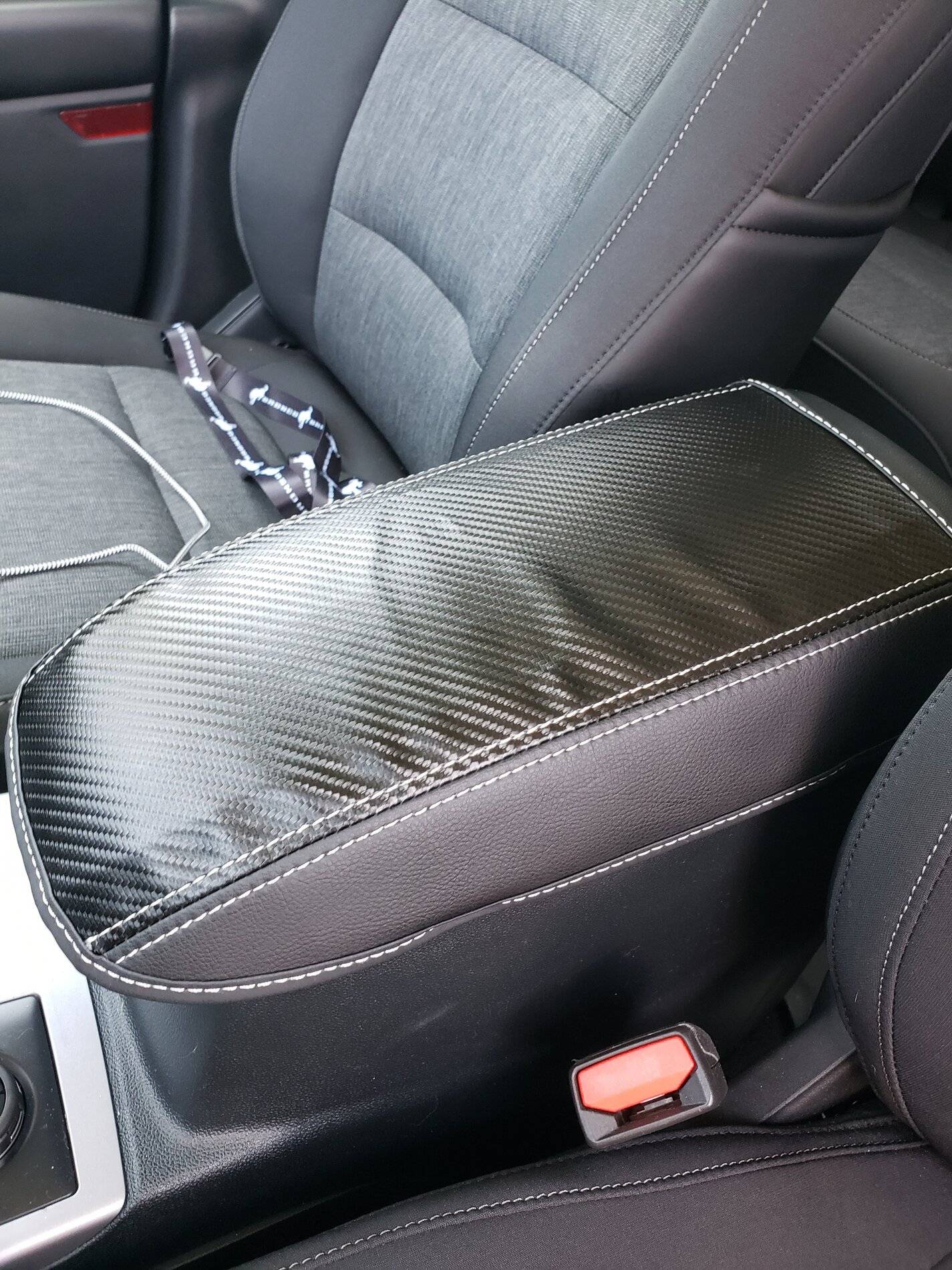 Ford Bronco Sport Anyone know of a center console armrest cover, preferably with bronco logo or Ford blue oval? 20210726_150739