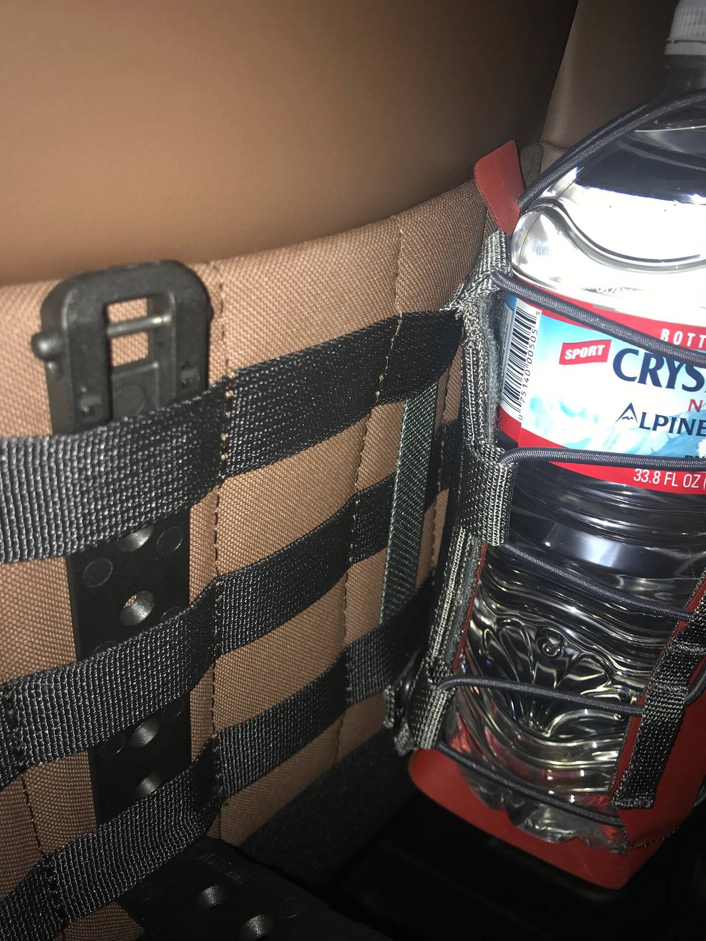 Ford Bronco Sport MOLLE Web (back of front row seats) Sizing Reference Pictures using MOLLE-Lok® connectors IMG_7441