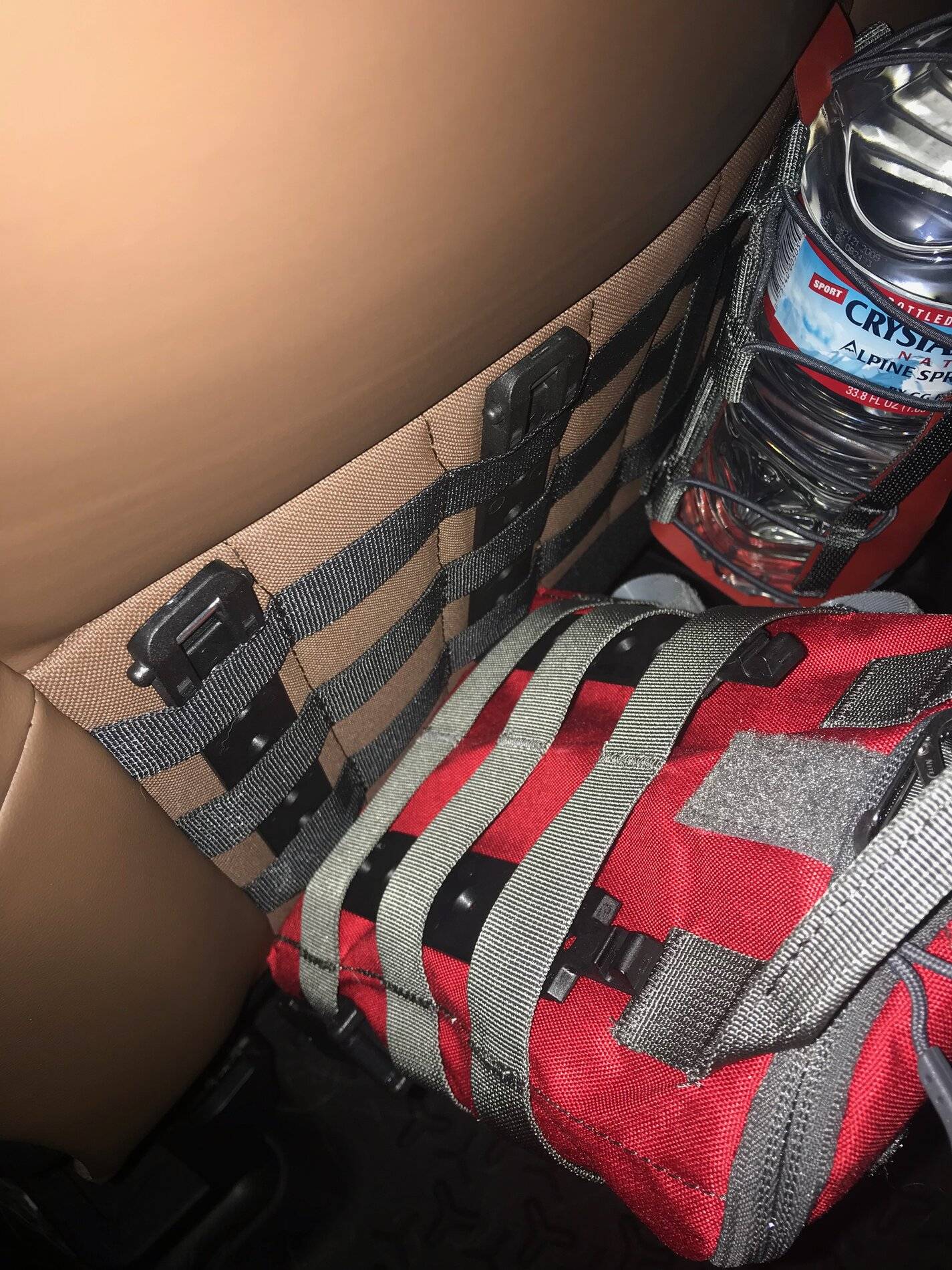 Ford Bronco Sport MOLLE Web (back of front row seats) Sizing Reference Pictures using MOLLE-Lok® connectors IMG_7442