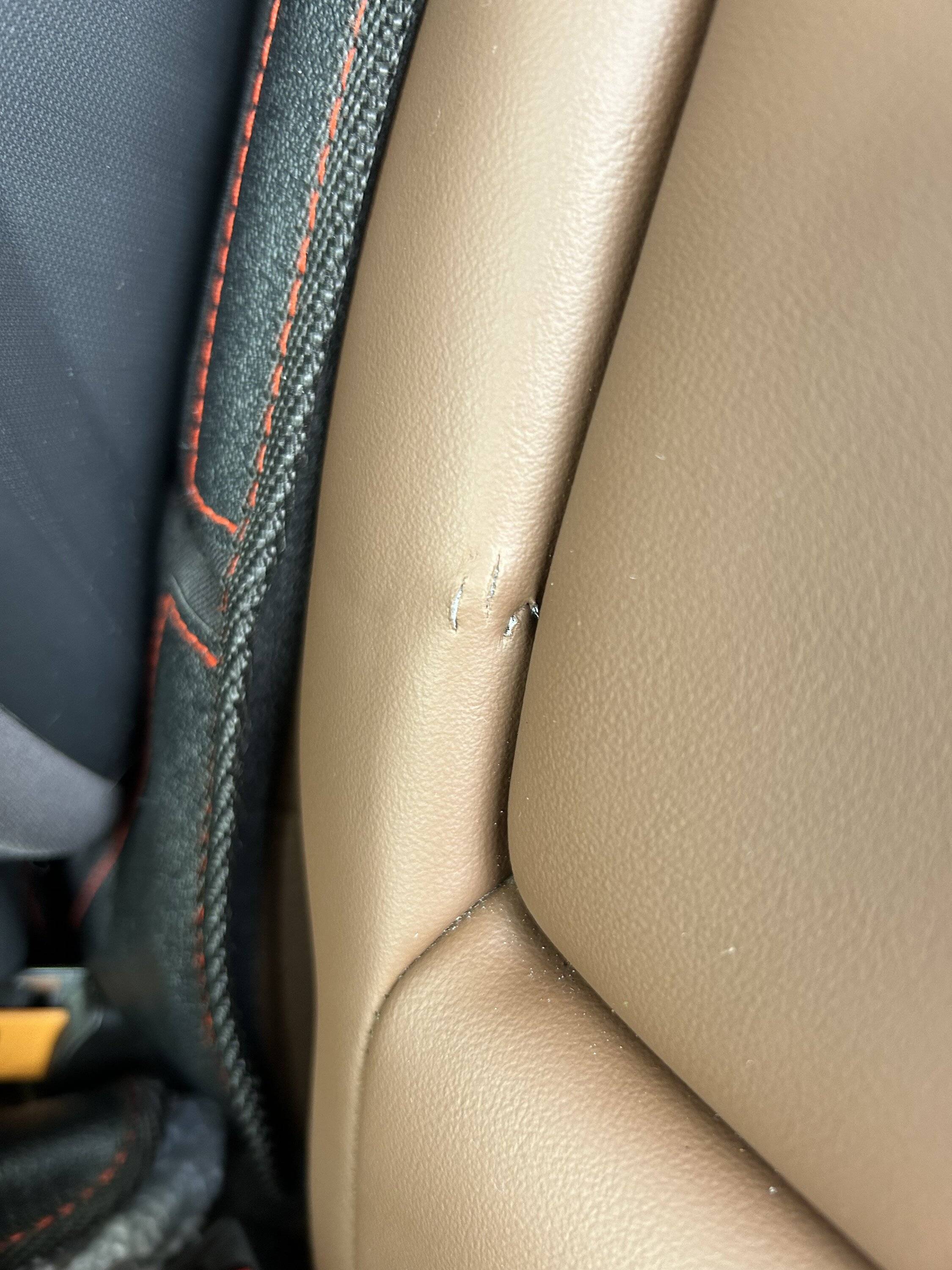 Ford Bronco Sport Rip in the leather IMG_8239