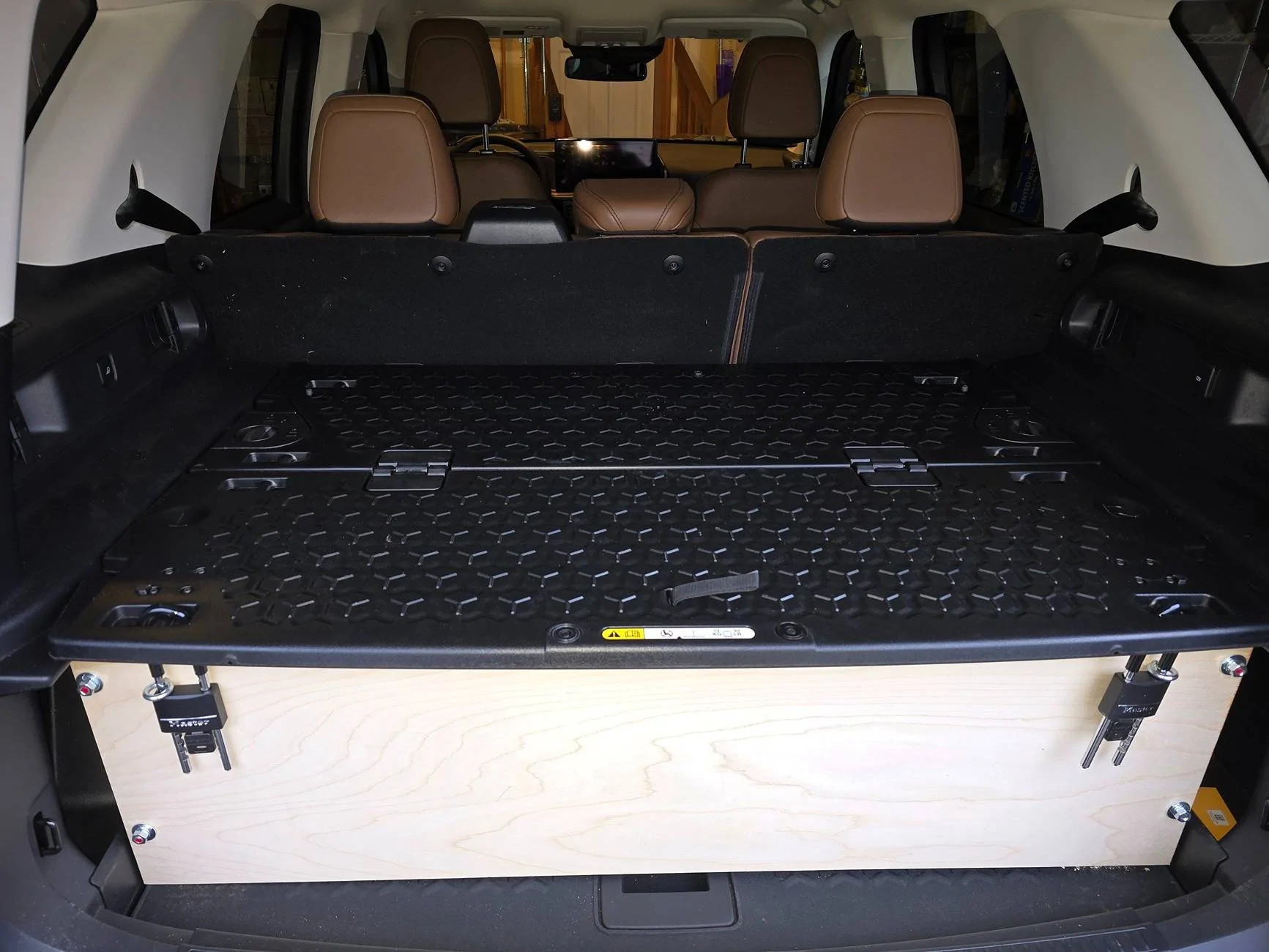 Ford Bronco Sport Adding Locking Storage under the Cargo Management System Cover, locking the top down 20250222_164943[1]