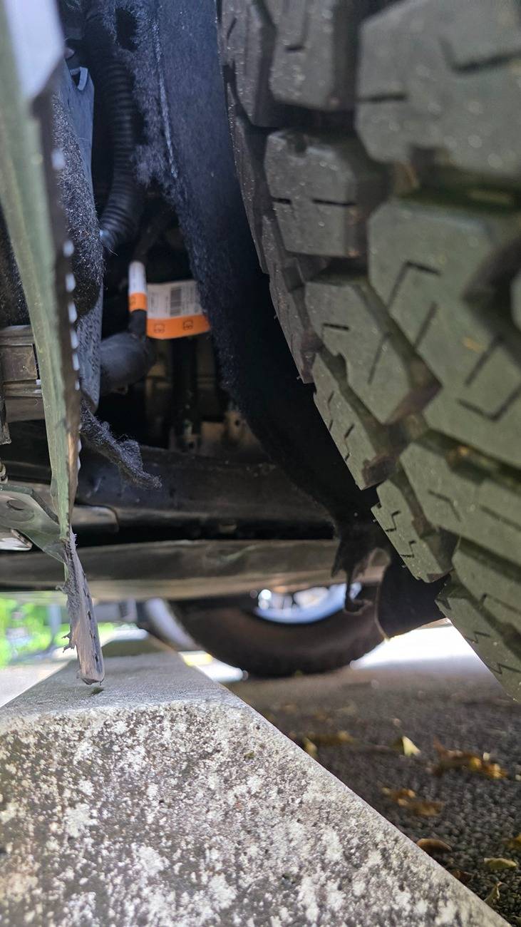 Ford Bronco Sport 235/65R17 Falkons's with 17x7.5 40mm offset wheels rubbing badly. Shredded felt wheel well liner up pretty bad 20250526_104241